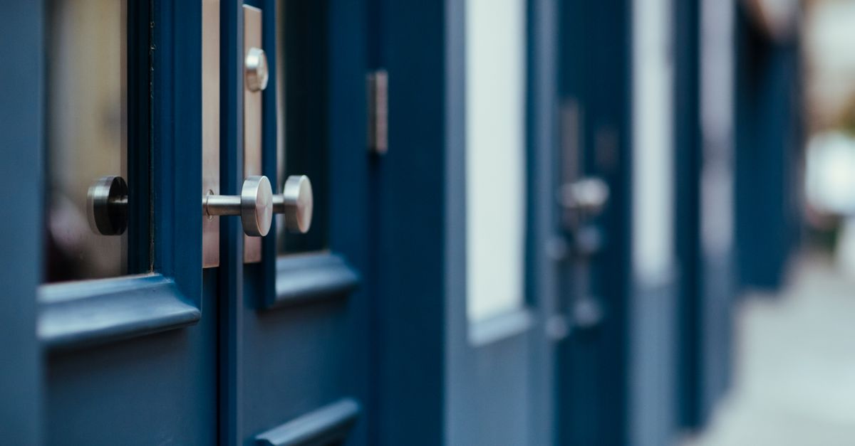 locksmith hands door — Fort Washington Locksmiths